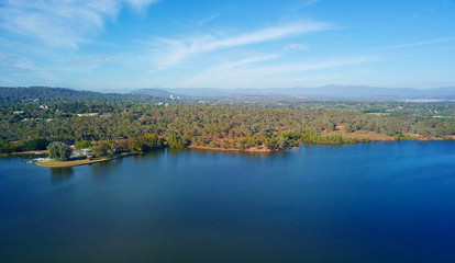 Wall Mural - Panoramic view of Canberra (Australia) in daytime, featuring Lake Burley Griffin.