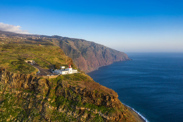 Fototapete - Lighthouse at Ponto do Pargo, Madeira, Portugal. Scenic landscape.
