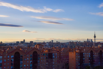 Wall Mural - Madrid Skyline view From Cerro del Tio Pio (Siete Tetas Park) during the evening. Vallecas, Madrid, Spain