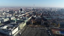 Aerial View Of Berlin Cityscape Is The Capital And Largest City Of Germany By Both Area And Population Showing The Memorial To The Murdered Jews Of Europe Below And The Television Tower In Background