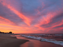 Amazing Orange, Pink, Red, And Purple Sunset Along The Beach In The Outer Banks Of North Carolina