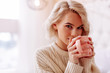 © zinkevych - Young beautiful woman with bob cut enjoying tasty tea