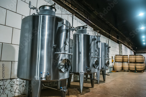 Stainless Steel Storage Tanks Or Aluminium Barrels Or Metal Vats For Wine Production Industrial Alcohol Fermentation In Vineyard Cellar Buy This Stock Photo And Explore Similar Images At Adobe Stock