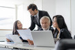 © Pormezz - Group of young office worker talking in the meeting.