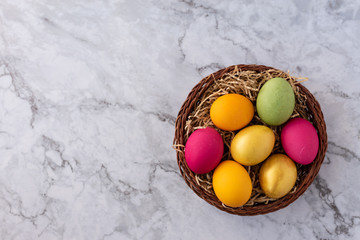 Traditional painted eggs for Holy Easter. Holiday greeting card concept. Marble background, top view