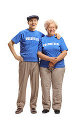 Poster - Senior man and woman volunteers smiling at the camera