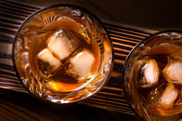 two glasses with ice drink top view