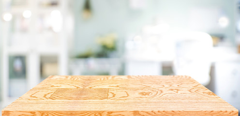 Wall Mural - perspective wood table counter in home office.empty wooden tabletop with blurred workplace backgroun