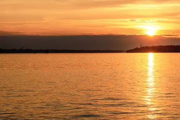 Wall Mural - sunset river sun clouds sky