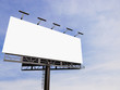 © pabijan - 3D rendering of blank billboard (empty advertisement) with clouds. Empty mockup template