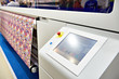 Wide format printer for on fabric and paper