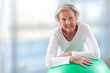 © JPC-PROD - Senior Woman with fitness ball in gym.