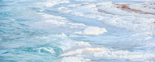 .incredibly Beautiful Seaside Of The Dead Sea With Blue Water And White Crystals Of Salt Near.selective Focus