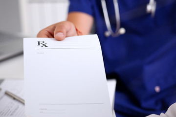 Male medicine doctor hand give prescription to patient