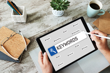 Wall Mural - Keywords. SEO, Search engine optimization and internet marketing concept on screen.