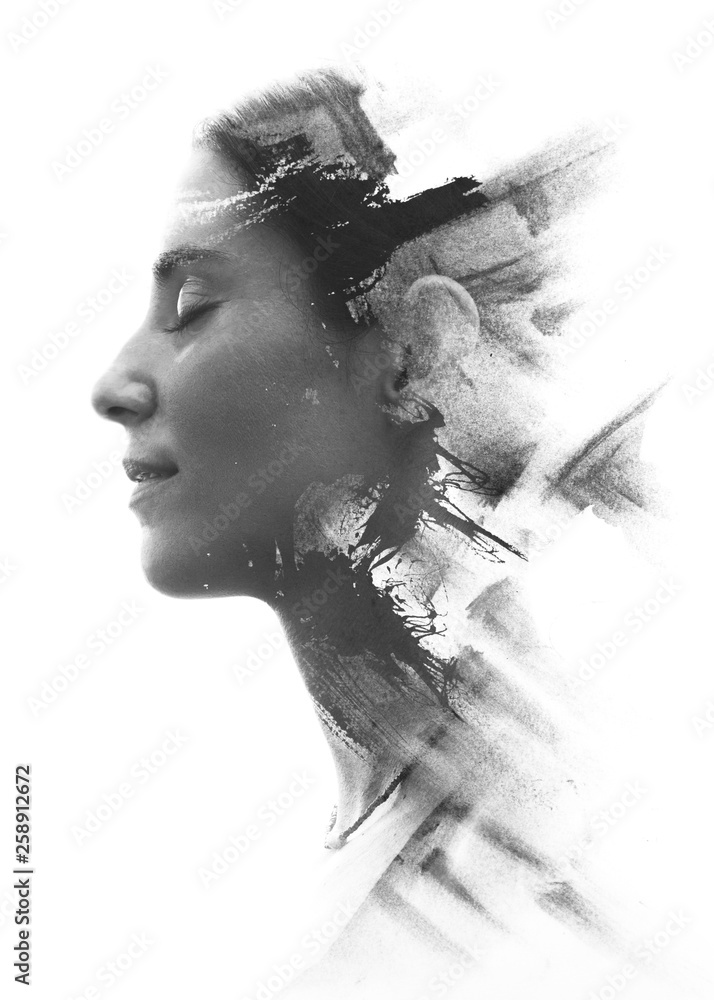 Paintography. Double exposure portrait of a young woman’s profile combined with handmade painting with a texture of brushstrokes disappearing into her face. Black and white - obrazy, fototapety, plakaty 