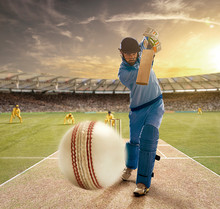 A Young Sportsman Playing Cricket With Stance Of Hitting The Ball	