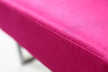 Wall Mural - close up detail of pink color fabric covering sofa furniture