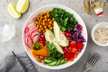 Lunch Bowl Salad With Avocado, Roasted Chickpeas, Kale, Cucumber, Carrot, Red Cabbage, Bell Pepper And Redish