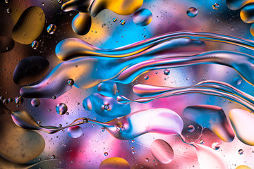 abstract colorful liquid water splash and bubbles background. macro photography