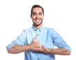 © New Africa - Man showing HELP gesture in sign language on white background