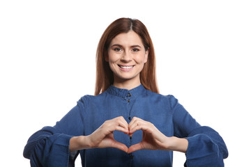 Wall Mural - Woman showing HEART gesture in sign language on white background