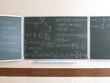 blackboard written with physical formulas