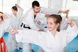 © JackF - Children trying martial moves in karate class