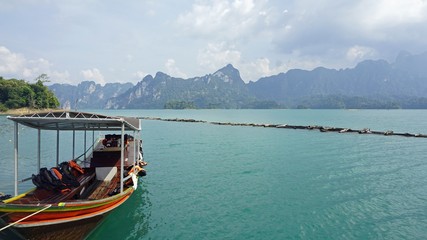 Wall Mural - longtail boat trip on chiao lan lake in thailand