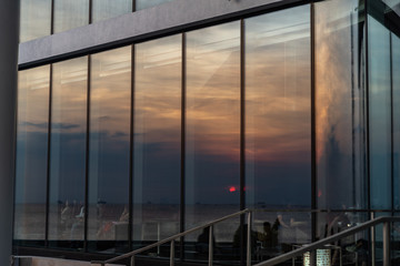 Wall Mural - Sunset at reflect to building Mirror