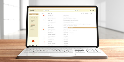 Email list on a computer laptop screen, wooden office desk, empty room background. 3d illustration