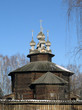 Wooden church in Kostroma, Russia on the spring blue sky background