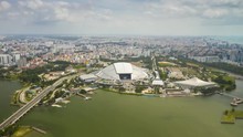 Sunny Flight Over Singapore City Famous Bay Sport National Stadium Aerial Panorama 4k Timelapse