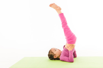 little girl practice yoga