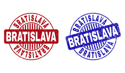 Grunge BRATISLAVA round stamp seals isolated on a white background. Round seals with distress texture in red and blue colors.