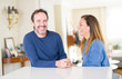 © Krakenimages.com - Romantic middle age couple sitting together at home