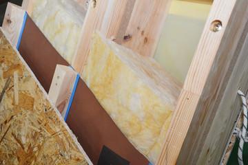 Wall Mural - Attic roof construction with damp proof, waterproof and mineral wool insulation layers.