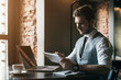 © Cressida studio - Young handsome businessman conducting negotiations with investors. Electronic business. Alternative payment services. Management of the projects on freelance. Cryptocurrency. Blockchain. Trader.