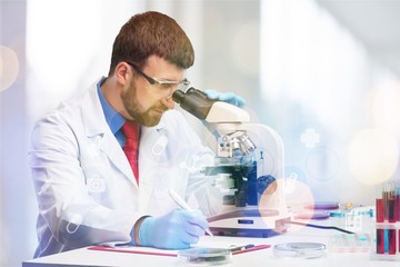 Young male scientist Working with Microscope