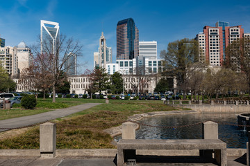 Wall Mural - Charlotte, North Carolina skyline cityscape on a spring day with copy space