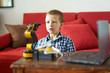© Per Swantesson/Stocksy - Concentrating boy learning how to program a robot