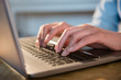© jamie grill photography/Stocksy - Typing on laptop