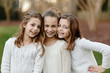 © Jakob Lagerstedt/Stocksy - Close up of three sister standing together