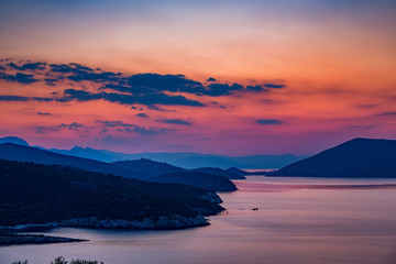 Colorful sunset over sea in Greece