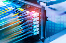 Optical Fiber Telecommunication Equipment And Patchcords Inside A Network Infrastructure.