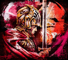 Graffiti on a brick wall of the  woman knight praying holding a sword