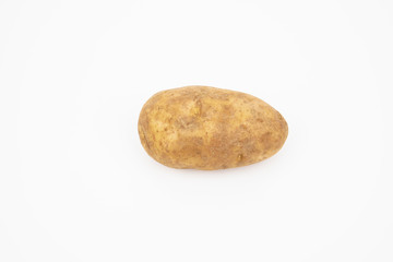 A raw russet potato isolated on white background