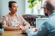 © Nejron Photo - Black girl attending job interview