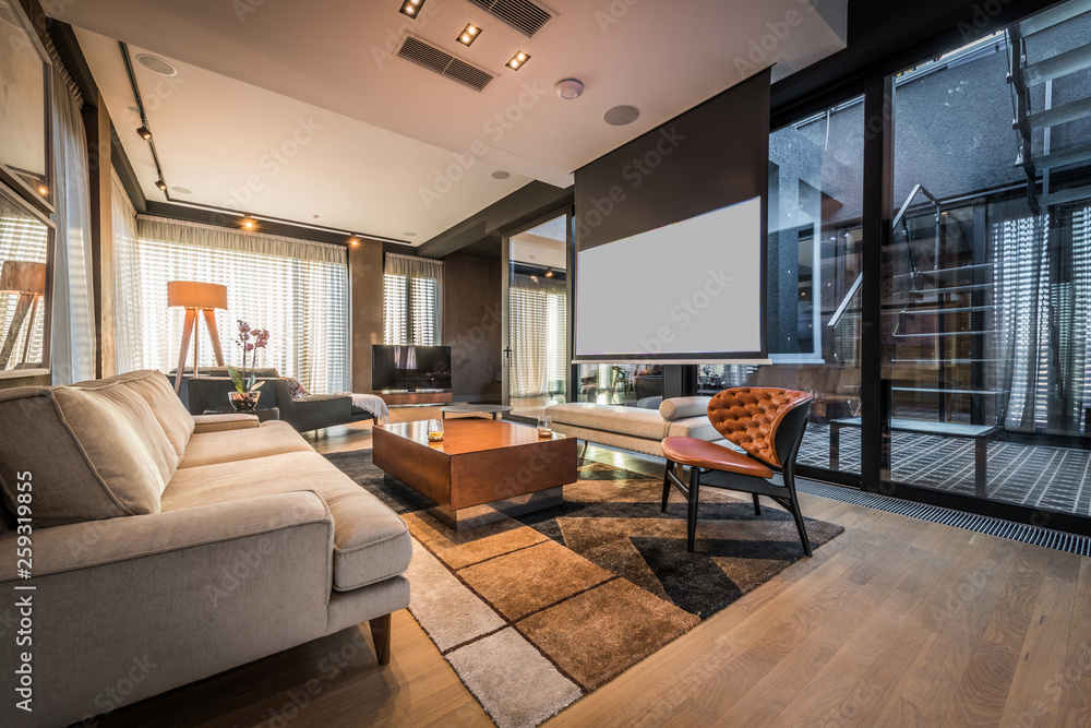 Interior of a living room in a luxury penthouse apartment - obrazy, fototapety, plakaty 