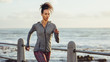 © Jacob Lund - Runner exercising on the seaside promenade